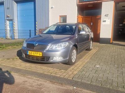 Grijs (metallic) Occasion 2012 Skoda Octavia Ambition Stationwagen | € 5.450 (Eerlijke prijs)