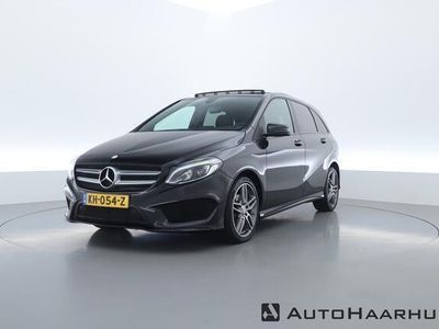 tweedehands Mercedes B180 Ambition AMG-Line | Navi | Pano | Cruise | PDC | LED | 1