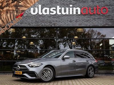 Grijs (metallic) Gebruikt 2021 Mercedes C200 AMG line Stationwagen | € 31.900 (Eerlijke prijs)