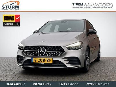 tweedehands Mercedes B180 Business Solution AMG Trekhaak Uitklapbaar Dodehoek Detectie Navigatie Camera Apple Carplay/Android Auto Stoelverwarming Rijklaarprijs!