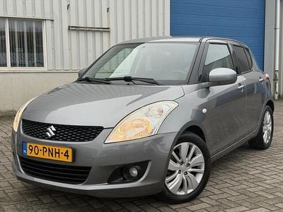 Grijs (metallic) Occasion 2011 Suzuki Swift Exclusive Hatchback | € 7.995 (Eerlijke prijs)