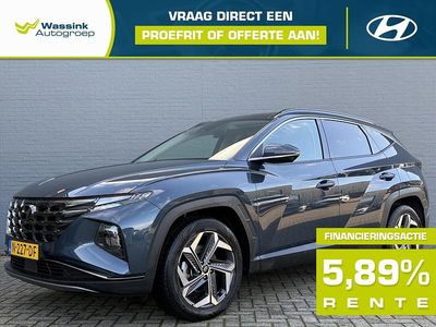 Teal blue (blauw metallic) Gebruikt 2021 Hyundai Tucson Premium SUV | € 30.835 (Eerlijke prijs)