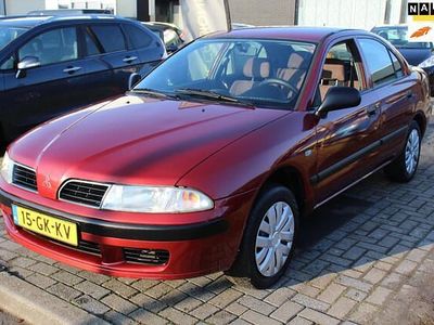 Rood (metallic) Occasion 2001 Mitsubishi Carisma Comfort Edition Hatchback | € 1.450
