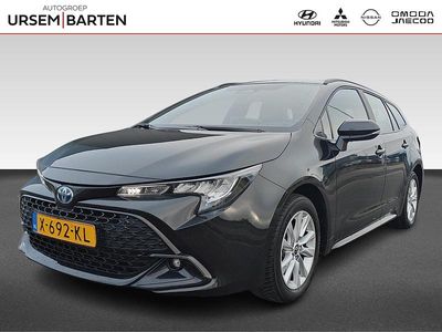 Zwart Gebruikt 2023 Toyota Corolla Hybrid Active Stationwagen | € 23.430