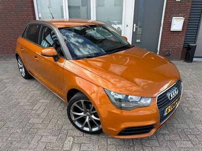 Oranje Gebruikt 2014 Audi A1 Attraction Hatchback | € 7.999 (Goede deal)