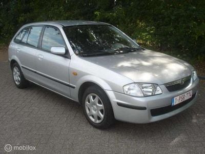 Occasion Mazda 323 88 PK (64 kW) 1999 Grijs Hatchback