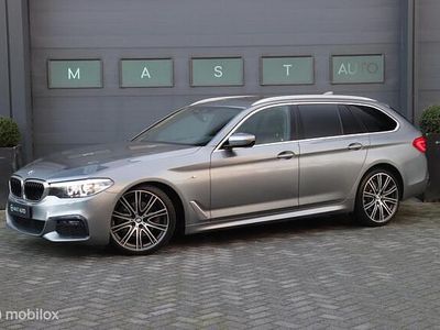 Grijs Gebruikt 2018 BMW 520 Executive Stationwagen | € 28.740 (Eerlijke prijs)