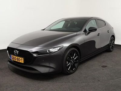 Machine gray (grijs metallic) Occasion 2024 Mazda 3 Homura-Line Hatchback | € 26.750 (Goede deal)