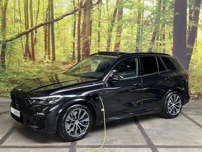tweedehands BMW X5 xDrive45e High Executive M-Sport Shadow Plug In Hybrid Luchtvering Panodak Head Up Virtual LED Sfeer