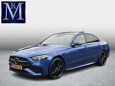 Blauw Gebruikt 2022 Mercedes C300e AMG line Sedan | € 42.899 (Eerlijke prijs)