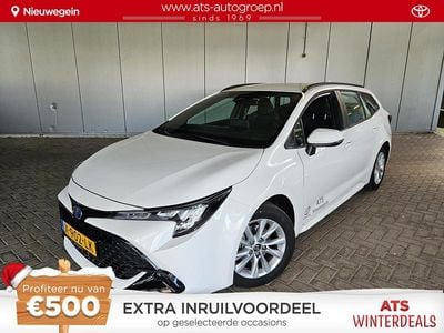 Wit Gebruikt 2023 Toyota Corolla Hybrid Active Stationwagen | € 28.950