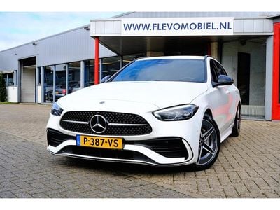 Wit Gebruikt 2022 Mercedes C180 AMG line Stationwagen | € 32.950 (Eerlijke prijs)