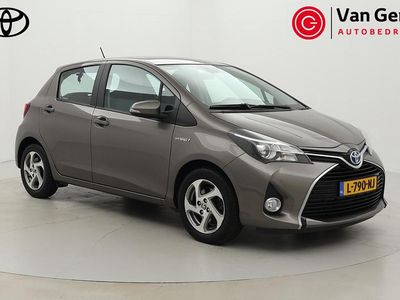 Bruin Gebruikt 2016 Toyota Yaris Hybrid Trend Hatchback | € 13.999 (Eerlijke prijs)