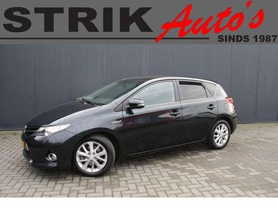 Grijs (metallic) Occasion 2014 Toyota Auris Hybrid Hatchback | € 9.229 (Eerlijke prijs)