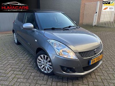 Grijs (metallic) Occasion 2011 Suzuki Swift Exclusive Hatchback | € 3.995 (Eerlijke prijs)