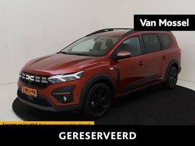 Bruin, metallic lak Occasion 2024 Dacia Jogger Extreme MPV | € 24.935 (Iets duurder)