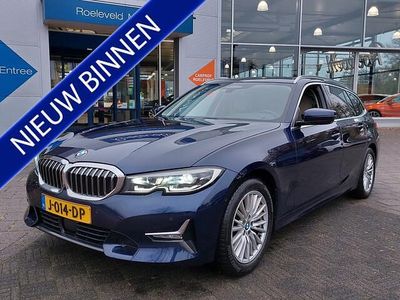 Blauw (metallic) Occasion 2020 BMW 320 Executive Stationwagen | € 31.950 (Iets duurder)