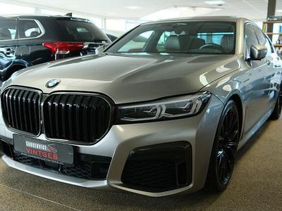Grijs (metallic) Gebruikt 2019 BMW 745e Executive Sedan | € 43.950 (Eerlijke prijs)
