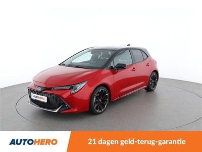 Rood (metallic) Gebruikt 2022 Toyota Corolla Hybrid Sport Hatchback | € 25.549 (Super prijs)