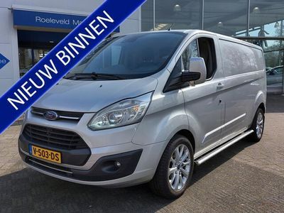 tweedehands Ford Custom TRANSIT290 2.0 TDCI 170pk L2H1 50th Anniversary Edition | Navi | Airco | Cruise | Pdc V+A+Camera | Half-Leder+Verwarmd+Elek.Verstel | Rijstrook+Licht+Regensensor | Mistlampen | 18''lm | Trekhaak