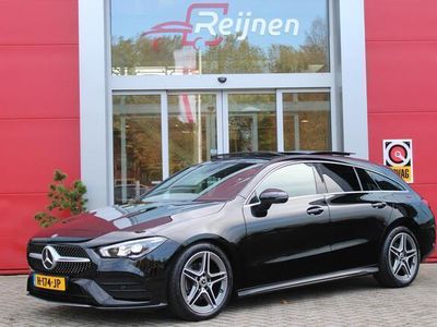 tweedehands Mercedes CLA180 Shooting Brake 136PK AUTOMAAT BUSINESS SOLUTION AMG | PANO DAK | NAVIGATIE | CAMERA | ELEK KLEP | VERKEERSLICHTWEERGAVE | LED KOPLAMPEN | KEYLESS ENTRY | STOEL VERW. |