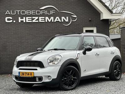 tweedehands Mini Cooper S Countryman 1.6 ALL4 Chili Navigatie Leder Panoramadaken Cruise Control Wit/Zwart Sportief