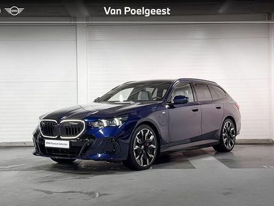 Blauw Occasion 2025 BMW 550e Comfort Edition Stationwagen | € 84.900 (Duur)