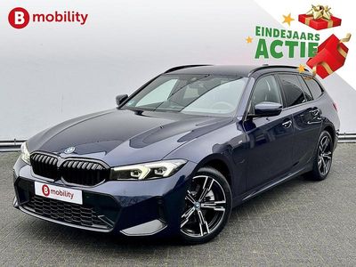 Blauw (metallic) Gebruikt 2025 BMW 320e Executive Stationwagen | € 37.695 (Super prijs)