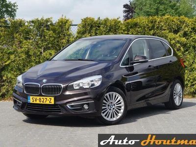 tweedehands BMW 218 2-SERIE Active Tourer i Essential High Executive Automaat|LEDER|NAVI|PDC|CRUISE|LMV|LED|STOELVERW.|TREKHAAK AFN.