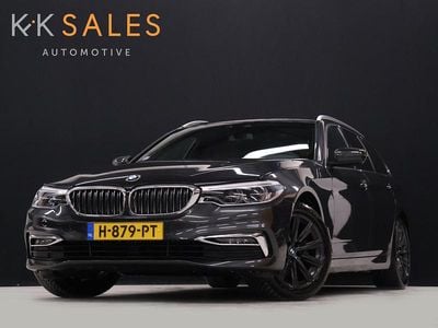 Grijs Occasion 2020 BMW 520 Executive Stationwagen | € 26.940 (Goede deal)