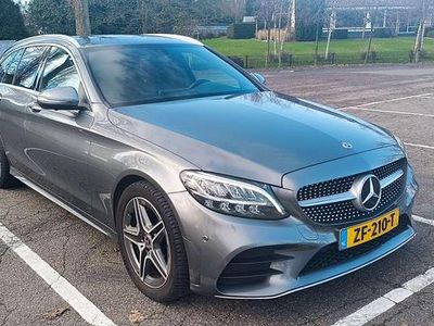 Grijs (metallic) Occasion 2018 Mercedes C180 Business Stationwagen | € 19.000 (Eerlijke prijs)