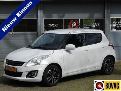 tweedehands Suzuki Swift 1.2 Exclusive Navi half leer alcantara Stoelverwarming LMV Parelmoer lak