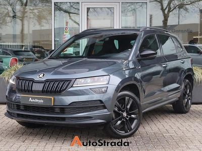 Grijs (metallic) Gebruikt 2021 Skoda Karoq SportLine SUV | € 24.700 (Eerlijke prijs)