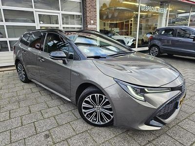 Bruin (metallic) Occasion 2021 Toyota Corolla Stationwagen | € 20.750 (Eerlijke prijs)
