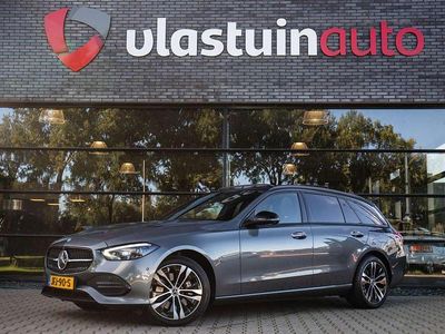 Grijs Occasion 2023 Mercedes C300e AMG line Stationwagen | € 36.900 (Eerlijke prijs)