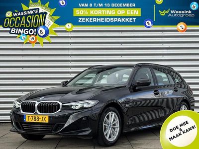 Zwart Occasion 2023 BMW 320e Basis Stationwagen | € 33.895 (Eerlijke prijs)