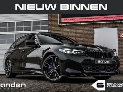 Occasion BMW 330 Basis 291 PK (214 kW) 2023 Zwart Stationwagen