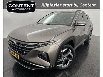Bruin Occasion 2021 Hyundai Tucson Premium SUV | € 29.490 (Eerlijke prijs)