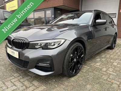 Grijs Occasion 2022 BMW 320e Executive Stationwagen | € 31.950 (Eerlijke prijs)