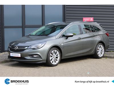 tweedehands Opel Astra Sports Tourer 1.4 T. 150 pk Innovation Navigatie / Trekhaak / ECC / 17"LMV / Licht-Regensensor / LED / Bluetooth "Vraag een vrijblijvende offerte aan!"