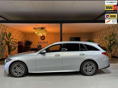 Grijs Occasion 2023 Mercedes C300e AMG line Stationwagen | € 43.990 (Eerlijke prijs)