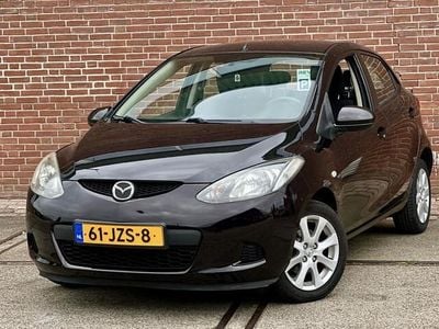 Bruin, metallic lak Occasion 2009 Mazda 2 Hatchback | € 3.950 (Eerlijke prijs)