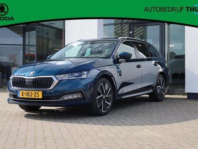 tweedehands Skoda Octavia Combi 1.4 TSI iV PHEV Business Edition Plus 18" LMV Head up! display 3 zone climatronic achteruitrijcamera half leder verstelbare bestuurdersstoel met geheugen sunset privacy glas licht en zicht multifunctioneel lederen verwarmbaar stuurwiel