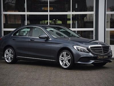 Grijs Occasion 2015 Mercedes C180 Prestige Sedan | € 14.875 (Eerlijke prijs)
