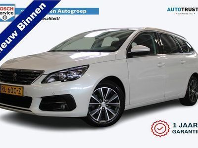 tweedehands Peugeot 308 SW 1.2 PureTech Blue Lease Premium | Incl. 1 jaar garantie | 1ste eigenaar! | Nieuwe distributieriem | 100% onderhouden | Stoelverwarming | Cruise | Apple carplay | Pano | Parkeercamera | PDC | NAP | DAB |