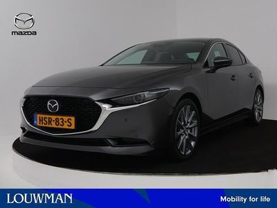 Machine grey (grijs metallic) Occasion 2025 Mazda 3 Takumi-Line Sedan | € 38.945 (Duur)