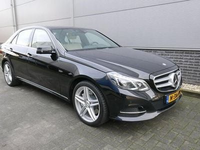 Zwart Occasion 2013 Mercedes E400 Avantgarde Sedan | € 19.750