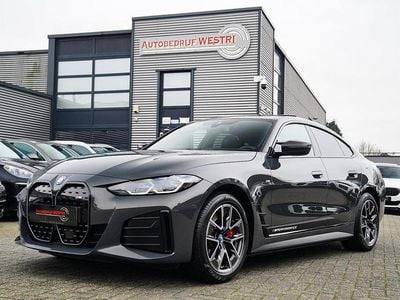 Grijs Gebruikt 2024 BMW i4 Executive Sedan | € 50.995 (Super prijs)