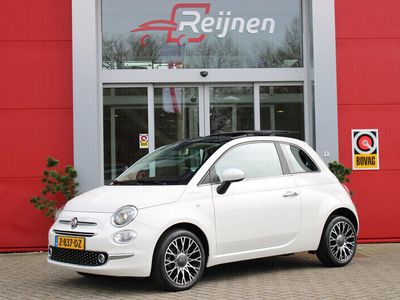 tweedehands Fiat 500 1.0 Hybrid 70PK DOLCEVITA | NAVIGATIE | PANORAMISCH SCHUIF/KANTEL DAK | APPLE CARPLAY/ANDROID AUTO | PARKEERSENSOREN | CRUISE CONTROL | LICHT/REGEN SENSOR | LICHTMETALEN VELGEN 16" "COLLEZIONE | HALF LEDEREN BEKLEDING | DIGITAAL INTRUMENTENPANEEL