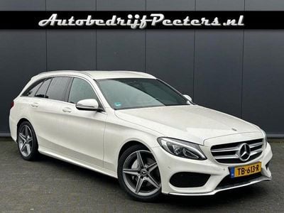 Wit Occasion 2018 Mercedes C180 AMG line Stationwagen | € 16.950 (Goede deal)